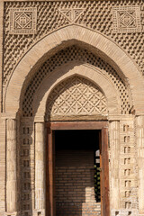 Fototapeta premium open door in a unpainted building