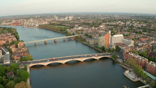 Circling aerial shot over Putney bridge west London