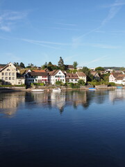 Fototapeta premium Landscape of Rhine River in STEIN AM RHEIN in SWITZERLAND - vertical