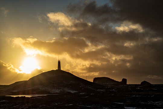 Reykjanesviti lighthouse at sunset in backlit, iceland