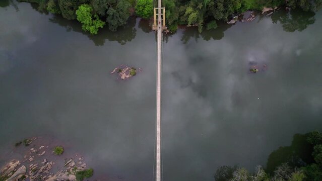 A suspension bridge used by people to walk, in Coorg, Karnataka, India. shot on 2023 January 