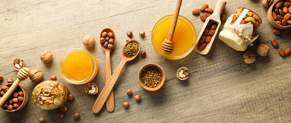 Concept of tasty and sweet food - honey with nuts