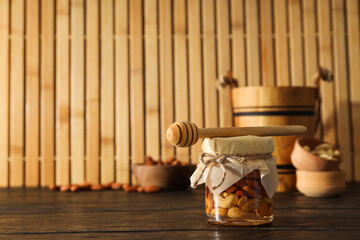 Concept of tasty and sweet food - honey with nuts