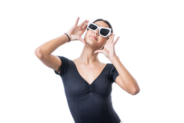 Studio portrait of young brunette model woman wearing funny fancy white sun glasses making shout-out. Caucasian girl shouting