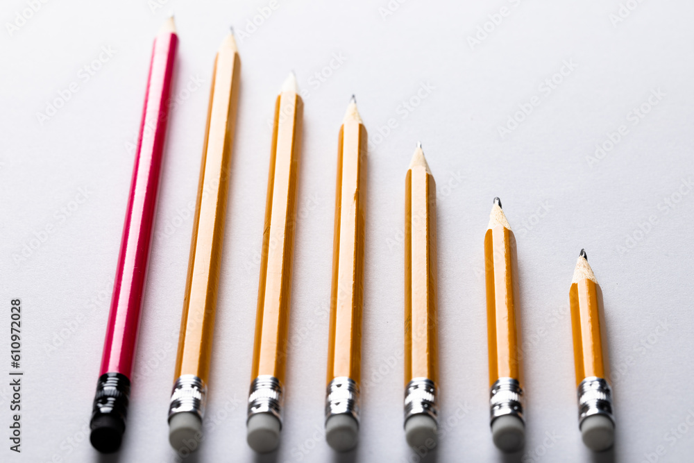 Aufkleber close up of pencils with erasers in row with copy space on white background