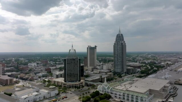 Downtown Mobile, Alabama skyline with drone video moving down.