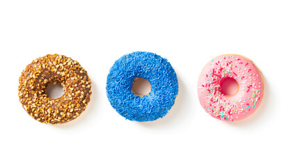 Three different color donuts top view on white background