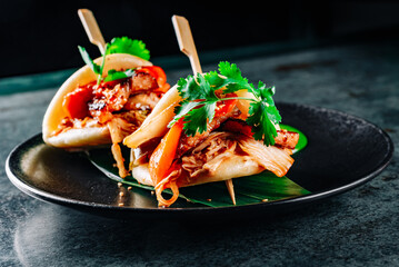 Gua bao, steamed buns with pork belly and vegetable