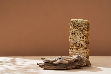 Podium for exhibitions and product presentations material stone, wood. Beautiful beige background...