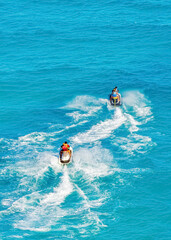 2 Jet Skis in the Caribbean sea, tropical Ocean, Vacation Concept, Cancun, Mexico