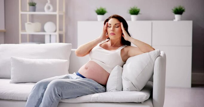 Pregnant Sick Woman With Headache, Discomfort