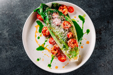 plate of stir fry with pak choi, cheese and shrimps on the table