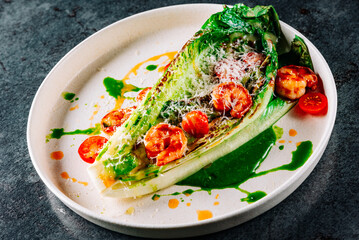 plate of stir fry with pak choi, cheese and shrimps on the table