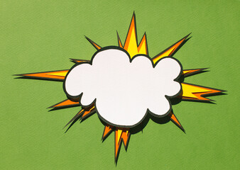 White comic speech bubble on green background with lightning. Handmade paper cutout artwork. Pop art concept. Cartoon flat lay style. Frame for your web banner. 