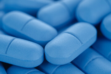 Heap of Blue pills macro. Pharmaceutical Industry. The medicine concept