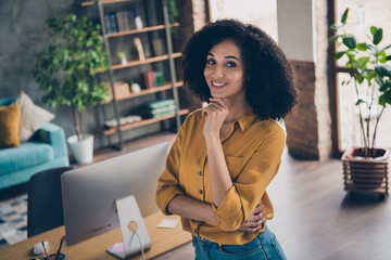 Photo of positive cheerful lady coach wear shirt smiling hand arm chin indoors workplace workshop