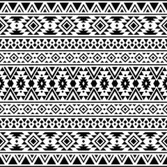 Abstract geometric seamless ethnic pattern with tribal Aztec motives. Vector texture design. Black and white colors. Design for textile, fabric, clothing, curtain, rug, ornament, wallpaper, wrapping.