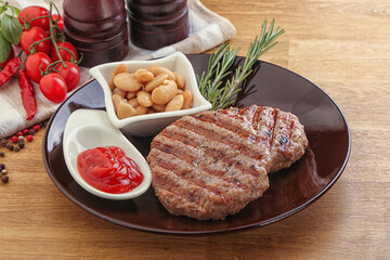 Grilled beef burger cutlet with sauce