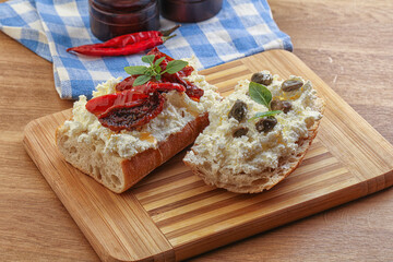 bruschetta with soft cheese capers and tomato