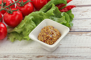 Mustard seeds sauce in the bowl