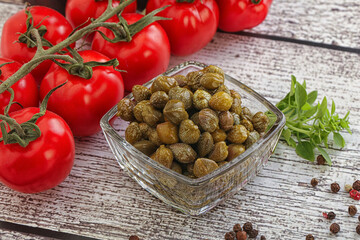 Marinated green capers in the bowl