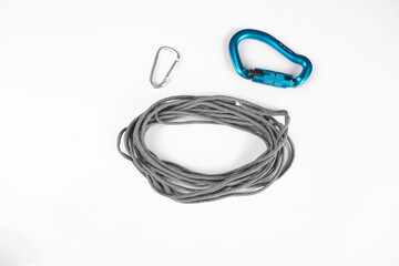 paracord gray tactical for survival untied assembled on white background with carabiners large blue and small silver