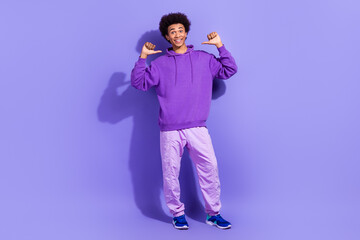 Full body cadre of young guy wear stylish outfit direct fingers himself personal branding good choice isolated on violet color background