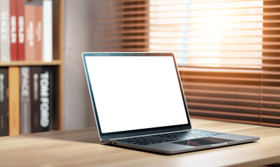 Mockup of laptop with blank white desktop screen.