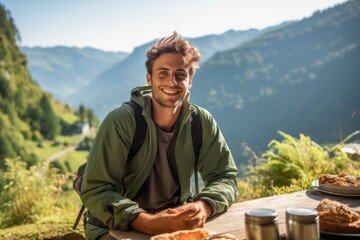 Medium shot portrait photography of a grinning boy in his 30s having breakfast against a scenic mountain trail background. With generative AI technology