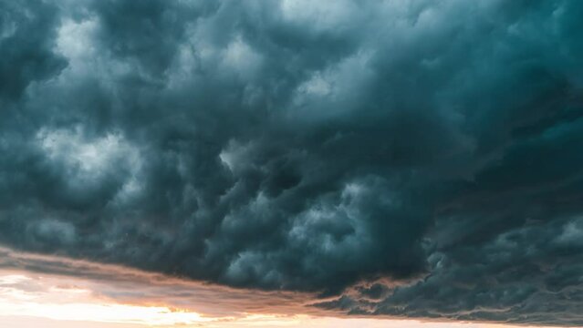 Dramatic storm sky above the ocean on nature background 4K