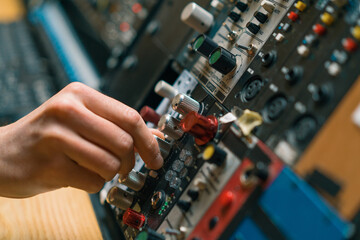 Sound Engineer Using Digital Audio Mixer Sliders Engineer Pressing Keys Control Panel Recording...