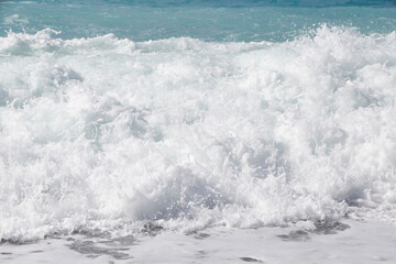 white foamy sea wave on beach in Nice