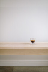 cup of coffee on wooden table