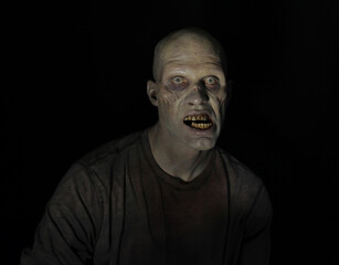 Fototapeta premium Male Zombie in Darkness Wide 