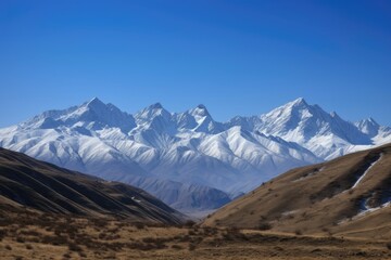 majestic mountain range, with snow-capped peaks and clear blue skies, created with generative ai
