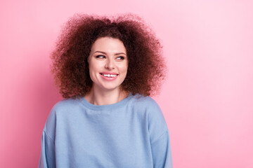 Portrait of young girl wear blue sweatshirt chevelure hairdo looking empty space new beauty salon open isolated on pink color background