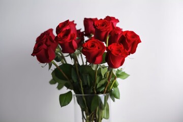 a vase of red roses against a white background, created with generative ai