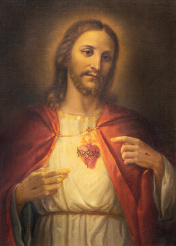 NAPLES, ITALY - APRIL 22, 2023: The painting of Heart of Jesus the church Basilica dell Incoronata Madre del Buon Consiglio.