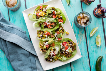 Turkey taco lettuce wraps on a platter, ready for serving.