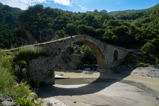 Kadiut bridge, anchient stone bridge in Lengarica Canyon close to P&euml;rmet in Albania