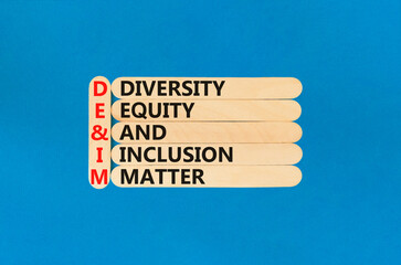DEI Diversity equity inclusion matter symbol. Concept words DEI diversity equity and inclusion matter on wood stick. Beautiful blue background. Business diversity equity inclusion matter concept