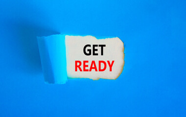 Get ready symbol. Concept words Get ready on a beautiful white paper on a beautiful blue background. Business, support, motivation and get ready concept. Copy space.