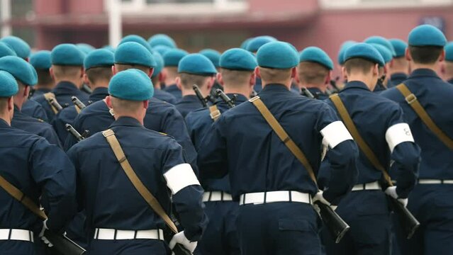 9 may russian war parade. A lot of men soldiers hold ak 47 rifle close up. Russia armed forces. Ukrainian military conflict. Army invasion. Kalashnikov ak47 weapon. Ukraine crisis. Warfare machine gun
