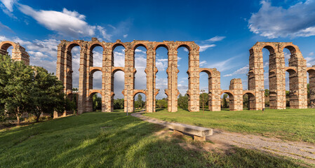 M&eacute;rida's Aqueduct of Miracles at sunset, with its ancient Roman architecture and imposing stone columns, this historical relic is an emblem of cultural heritage.