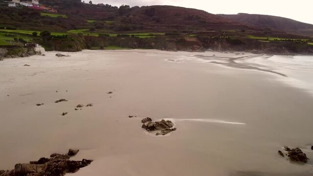 Empty Sandy Shore Of Playa de Caion In Galicia, Spain During Sunrise. Aerial Drone Shot