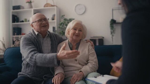 Happy senior couple satisfied with therapy, saved marriage, reconciliation
