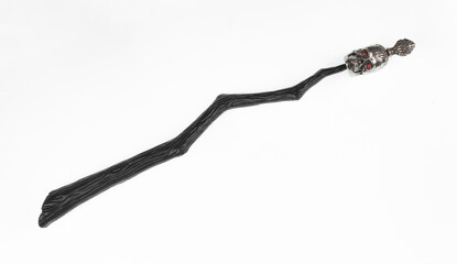 witch magic black wooden wand isolated on white background