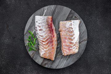 fillet of white fish without skin and bones fresh seafood healthy meal food snack on the table copy space food background rustic top view pescatarian diet