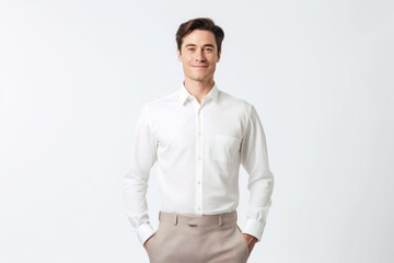 Fototapeta premium Environmental portrait photography of a glad boy in his 30s wearing an elegant long-sleeve shirt against a white background. With generative AI technology