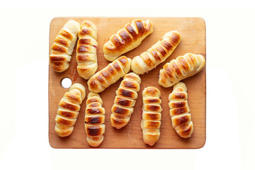 Tray with pies on a white background. Delicious homemade baking from the oven on a wooden tray, Top view. Cooking, homemade traditional pastries